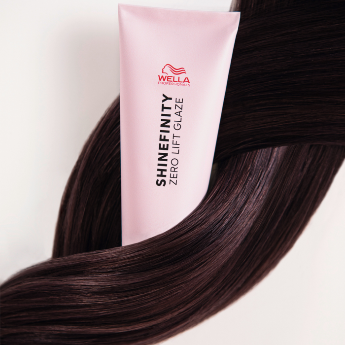 Wella Shinefinity bottle plaited into shiny brown hair