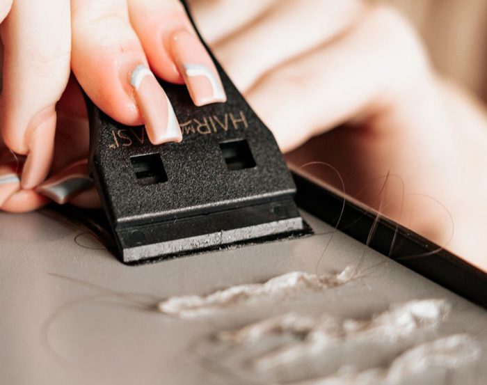 Tape in hair extension removal using HME Tapes Made Easi tool