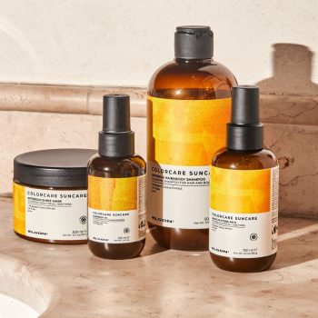 Elgon Colourcare Suncare hair products on a marble surface in warm sunlight