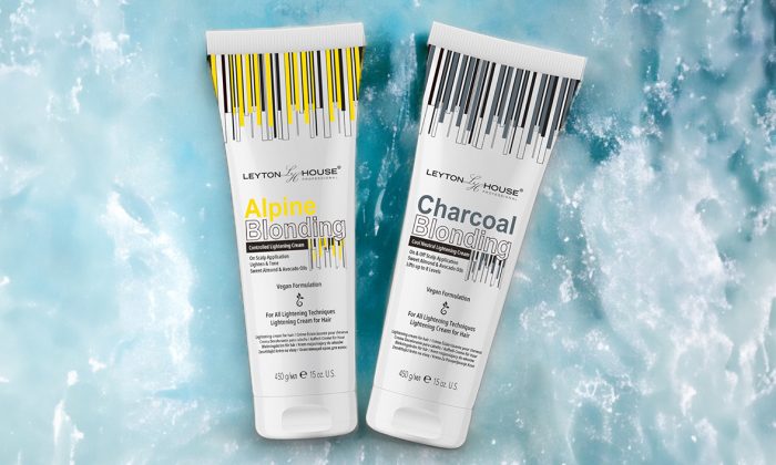 Leyton House Professional Alpine Blonding Cream and Charcoal Blonding Cream on a background of blue water