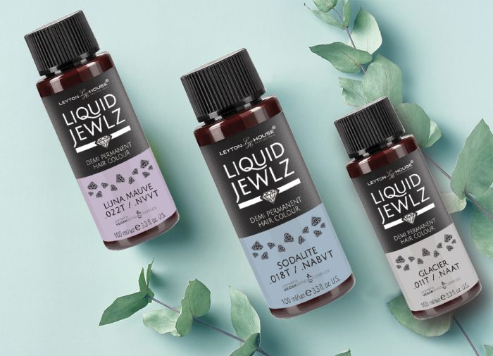Leyton House Professional Liquid Jewlz hair colour bottles on a light green background with botanical leaves