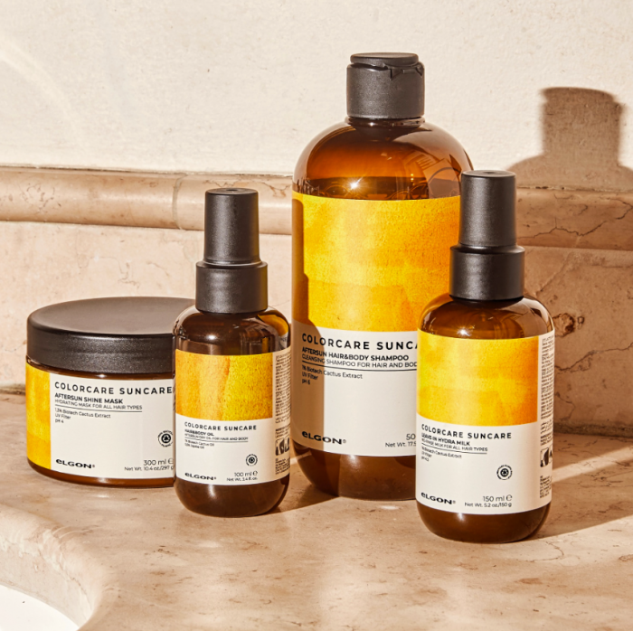 Elgon Colorcare Suncare products on a marble background