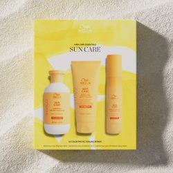 Wella Suncare Travel Kit on a sandy background