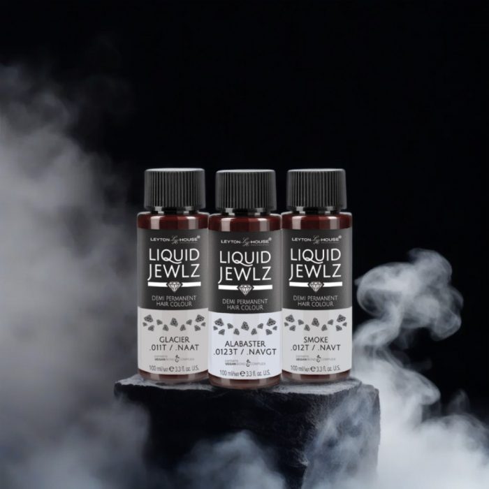 Leyton House Liquid Jewlz demi-permanent hair colour gloss toners on a black background with white smoke