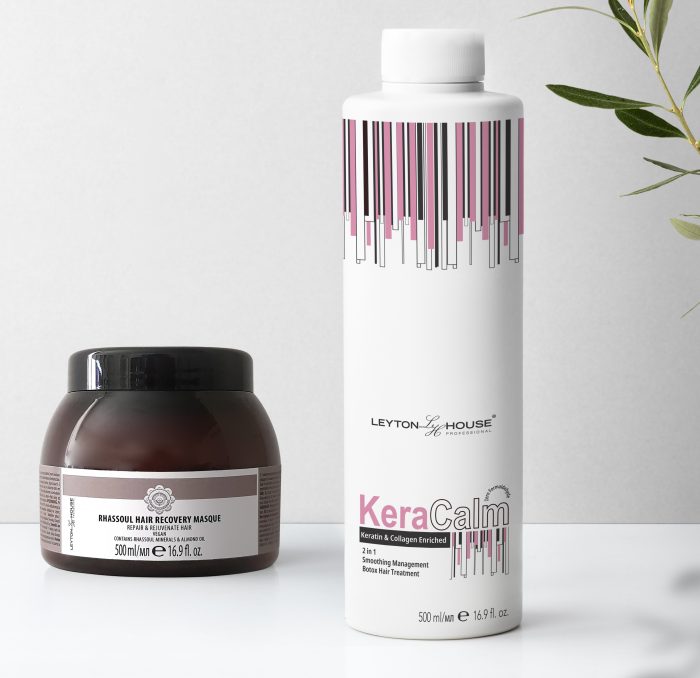 Leyton House KeraCALM and Rhassoul Hair Recovery Masque on a white work top with green leaves