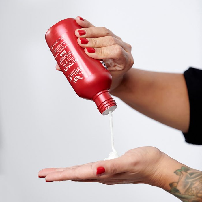 image of wella shampoo pouring out of bottle
