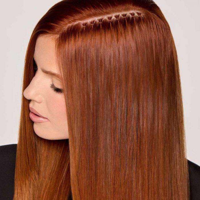 image of model wearing copper invisi-tip nano bonds