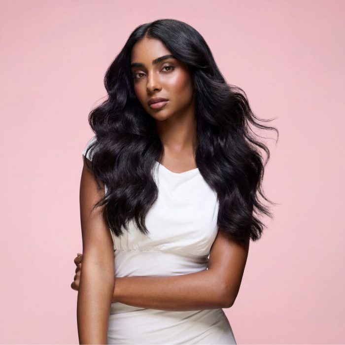 image of woman with long black glossy wavy hair