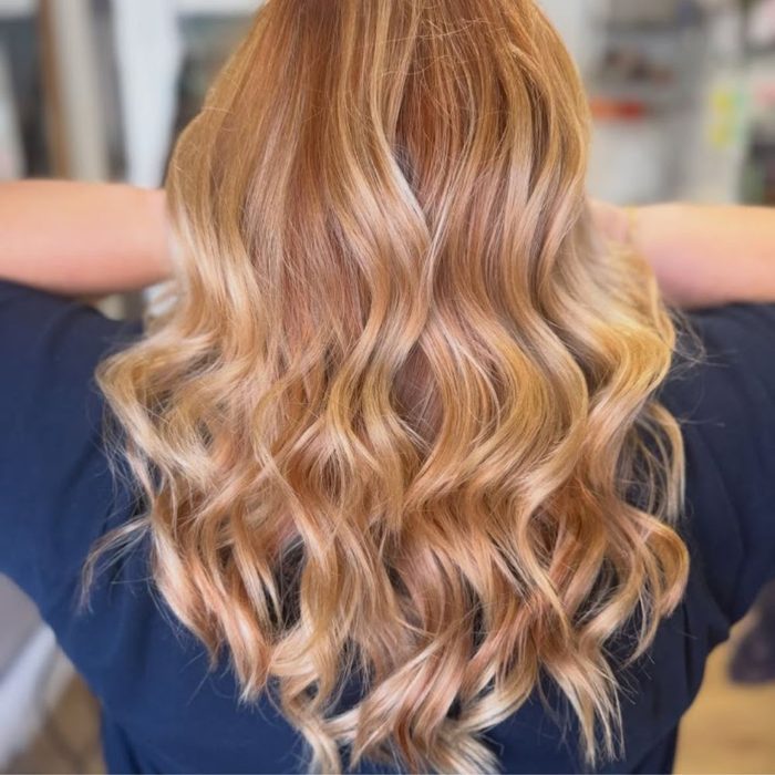 image shows woman with Autumn 2026 Maple Blonde hair trend