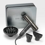 Diva Pro Styling Atmos 2 Atom hair dryer with nozzles, diffuser and hair brush on a grey marble background